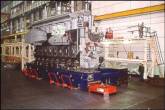 Large heavy diesel engines are floated on air during manufacturing and engine assembly