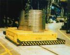 Automated guided vehicle systems for handling heavy loads in the steel and stamping industry